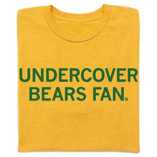 Kelly green t-shirt with gold text that reads UNDERCOVER BEARS FAN.