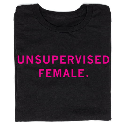 Black union-made t-shirt featuring the text UNSUPERVISED FEMALE printed in bright Rhodamine Red.