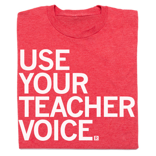 Heather red t-shirt with the white text USE YOUR TEACHER VOICE. printed on the front.