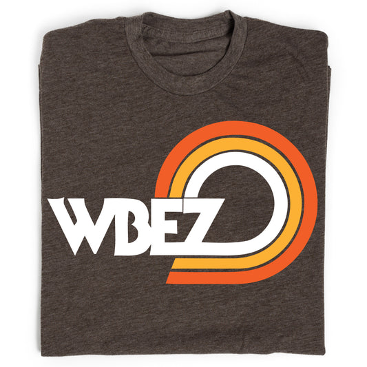 Dark gray T-shirt featuring an officially licensed WBEZ Chicago logo with a retro orange and yellow circular graphic.