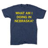 Dark blue heathered RAYGUN t-shirt with the yellow text WHAT AM I DOING IN NEBRASKA? printed on the front.