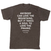 Dark grey union made t-shirt featuring a Willa Cather quote that reads: ANYBODY CAN LOVE THE MOUNTAINS, BUT IT TAKES A SOUL TO LOVE THE PRAIRIE.