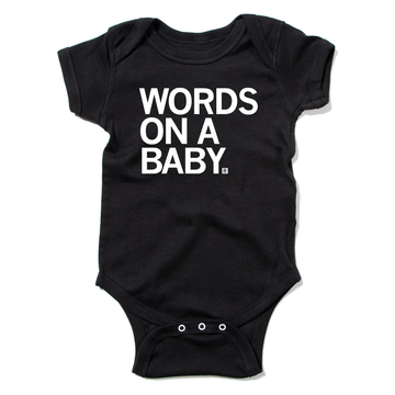 Black baby onesie with the text WORDS ON A BABY printed in white on the chest.