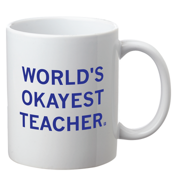 White ceramic World’s Okayest Teacher mug with blue text.
