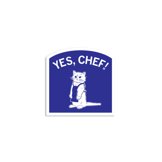Blue RAYGUN vinyl sticker featuring a white illustration of a cat wearing an apron, with the text YES, CHEF! above it.
