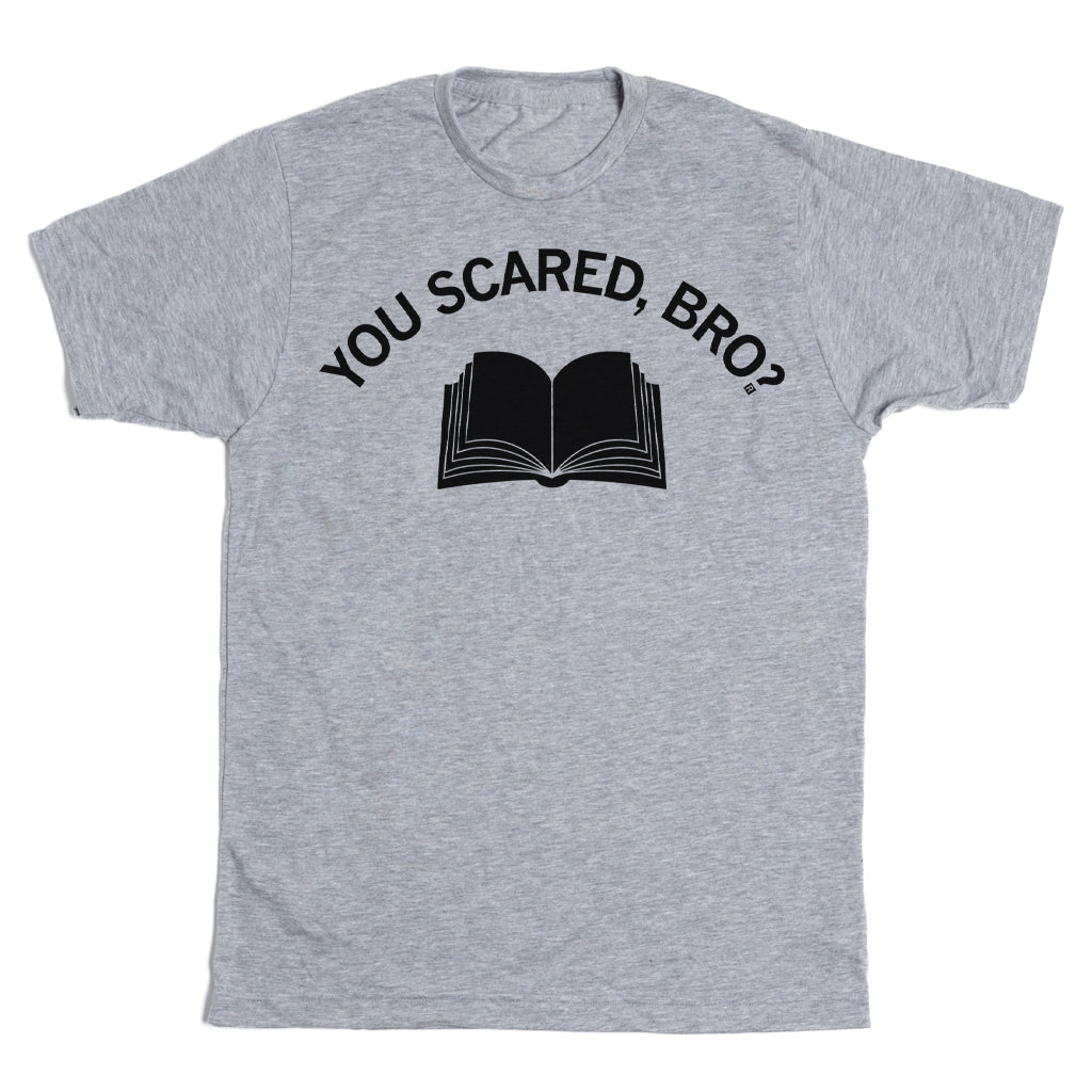 Heather gray RAYGUN t-shirt featuring an illustration of an open book with the text YOU SCARED, BRO? printed in black.