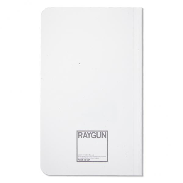 White notebook with a blue screen-printed Raygun logo and text on the bottom cover.