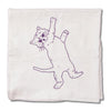 A white flour sack kitchen towel printed with a purple line drawing of a cat lying on its back.