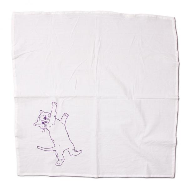 A white flour sack kitchen towel featuring a line drawing of a cat lying on its back.