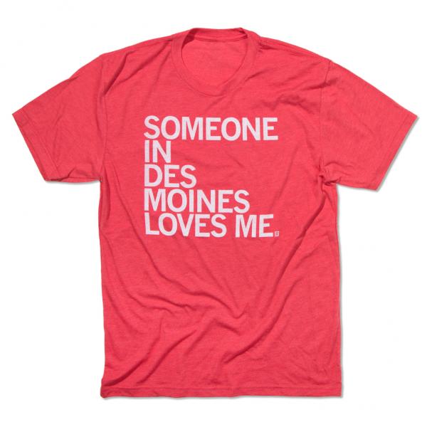 Heather red t-shirt with white text that reads, SOMEONE IN DES MOINES LOVES ME.