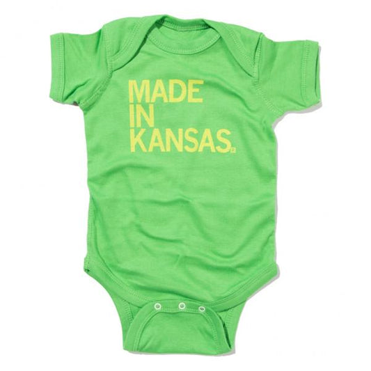 Bright apple green infant onesie with MADE IN KANSAS printed in yellow on the chest.