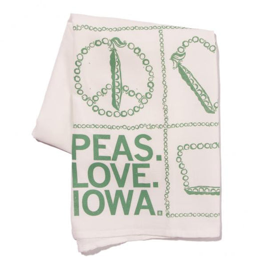A white RAYGUN flour sack towel featuring a green graphic of a pea pod inside a peace sign and the text PEAS. LOVE. IOWA.