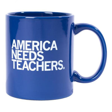 Blue dishwasher-safe ceramic mug with the text AMERICA NEEDS TEACHERS printed in white.