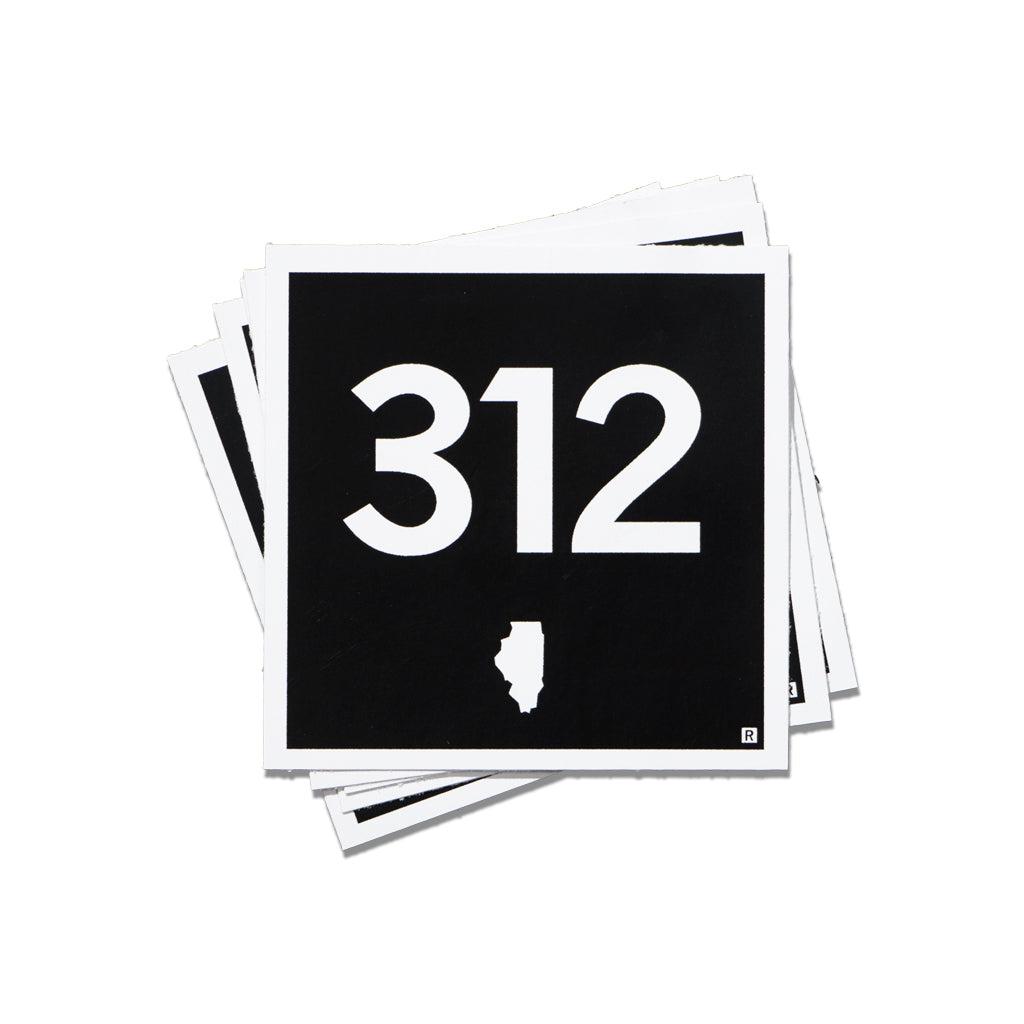 A stack of square 312 Illinois area code stickers featuring the number 312 in white text on a black background, with a small white silhouette of Illinois below.