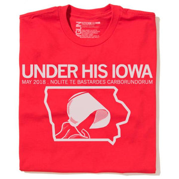 Red union made t-shirt featuring the text UNDER HIS IOWA and MAY 2018. NOLITE TE BASTARDES CARBORUNDURUM above a graphic of a bonnet silhouette inside an outline of the state of Iowa.