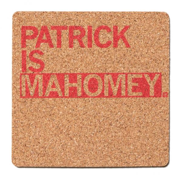 Square cork coaster with red text that reads, PATRICK IS MAHOMEY.