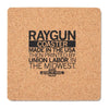 Square cork coaster printed with the text, RAYGUN COASTER MADE IN THE USA THEN PRINTED BY UNION LABOR IN THE MIDWEST, featuring a small union label logo at the bottom.