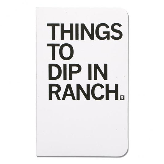 White notebook with THINGS TO DIP IN RANCH printed in large black letters on the cover.