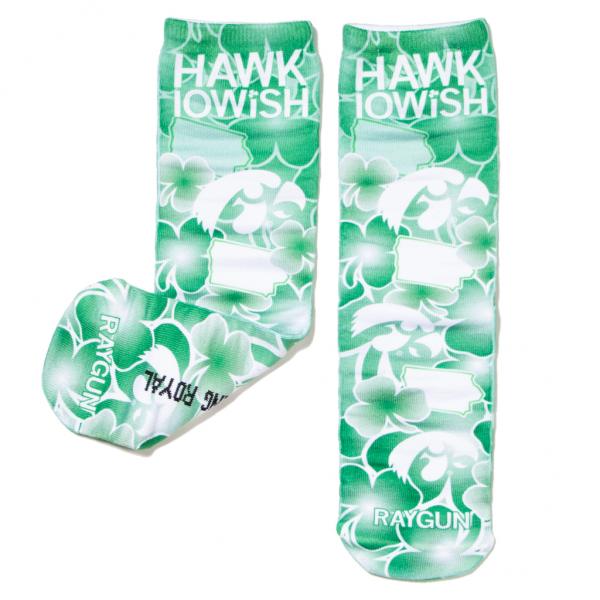 Pair of green and white patterned, handmade socks featuring Iowa Hawkeyes logos, shamrocks, and the text HAWK IOWISH and RAYGUN.