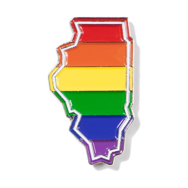 Illinois Gay Pride enamel pin in the shape of the state, colored with horizontal stripes of the rainbow pride flag.
