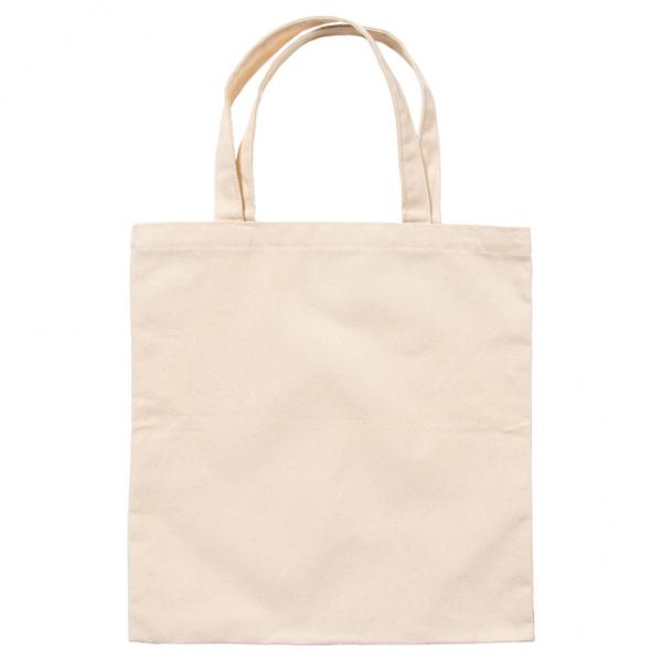 Plain beige canvas tote bag with two handles, decorated with a pollinator-friendly design.