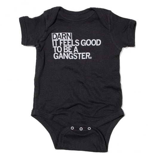 Black union made baby onesie with the white text DARN IT FEELS GOOD TO BE A GANGSTER.
