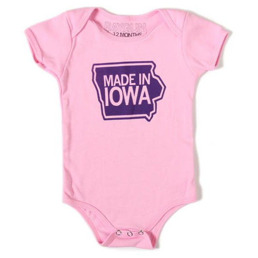 Light pink baby rib cotton bodysuit featuring a purple graphic of the state of Iowa and the text MADE IN IOWA.
