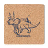 Square cork coaster featuring an illustration of a triceratops with Chicago-style skyscrapers and a building on its back, labeled CHICERATOPS.