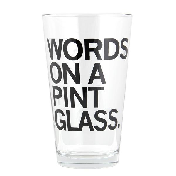 Clear, dishwasher-safe pint glass printed with the black text, WORDS ON A PINT GLASS.