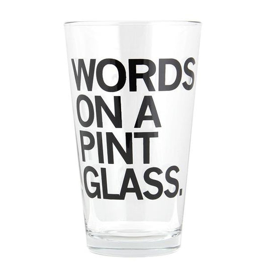 Clear, dishwasher-safe pint glass printed with the black text, WORDS ON A PINT GLASS.