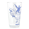 Clear pint glass with a blue illustration of Abraham Lincoln riding a T-Rex while holding a rifle, with the word FREEDOM printed at the base.