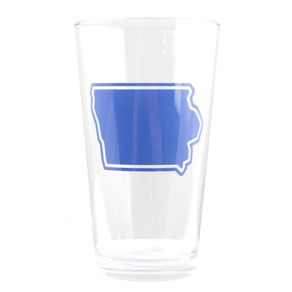 Clear pint glass printed with a blue outline and fill of the state of Iowa using soy-based ink.