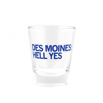 Clear dishwasher-safe glass shot glass with the blue text DES MOINES: HELL YES printed on the side.