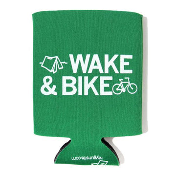Green foam RAYGUN drink cooler with white text that reads WAKE & BIKE, accompanied by icons of a tent and a bicycle.
