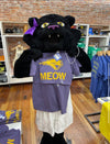 A black panther mascot with a purple hair bow holds up a union made purple Panthers t-shirt featuring a panther logo and the word MEOW in gold lettering.