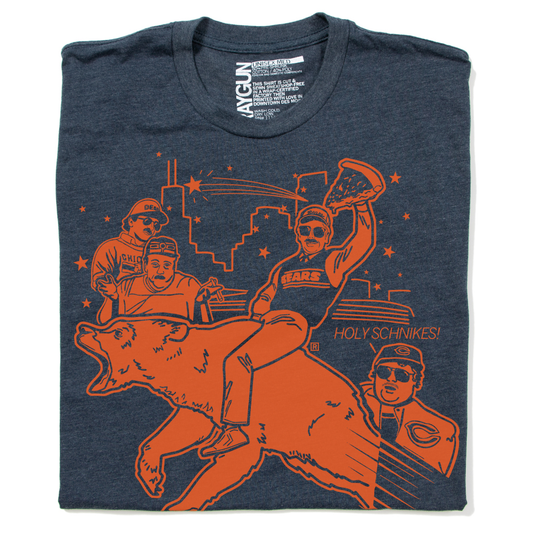 Folded heather navy t-shirt with orange print depicting the Bears super fans with a bear and a slice of deep dish pizza in front of the Chicago Skyline.