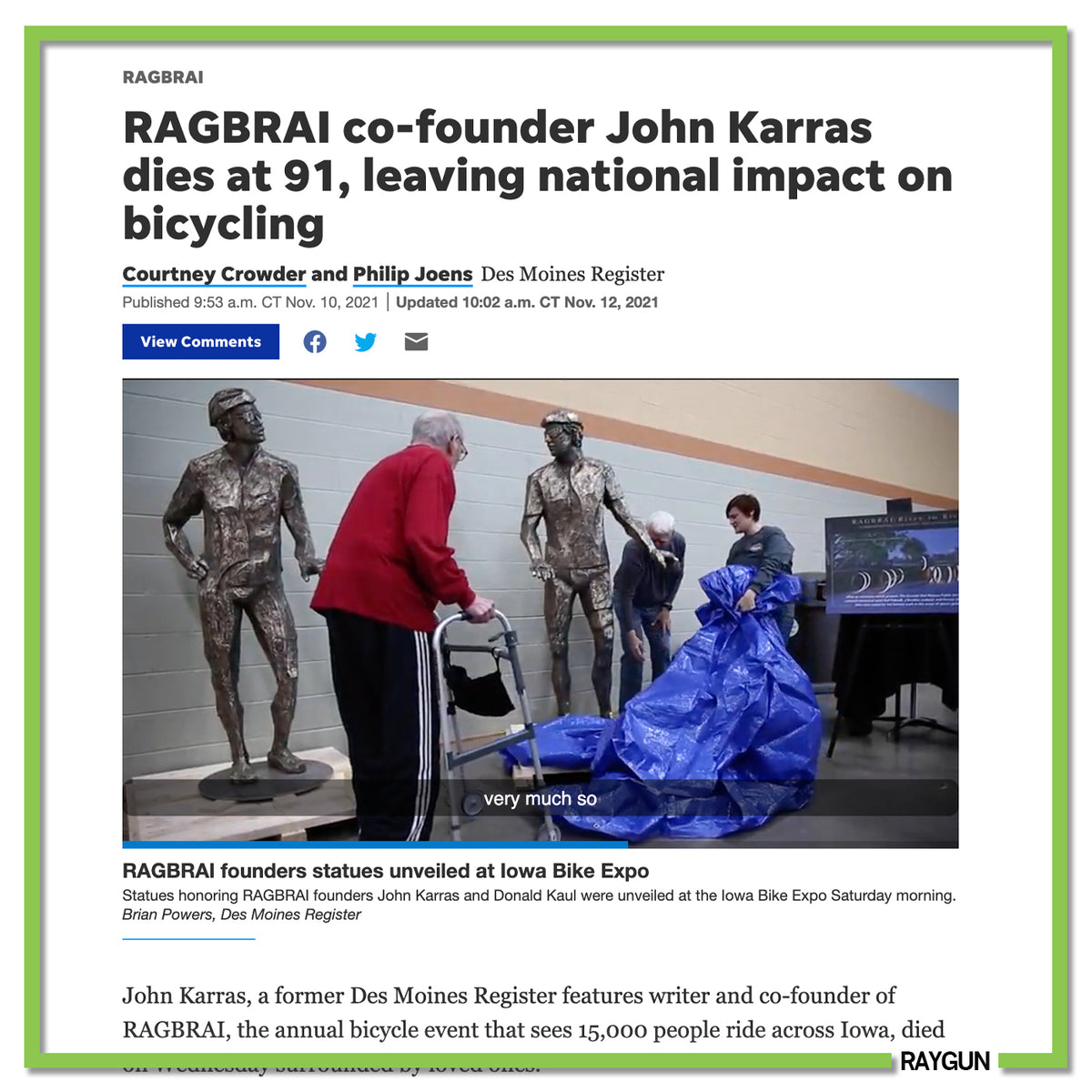 A news article about the death of RAGBRAI co-founder John Karras, featuring statues of the founders being unveiled at an expo where an attendee wears an Iowa t-shirt.