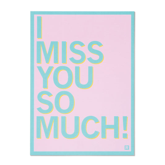 A pink I Miss You postcard with a turquoise border and the text I MISS YOU SO MUCH! in stacked, yellow-outlined turquoise letters.