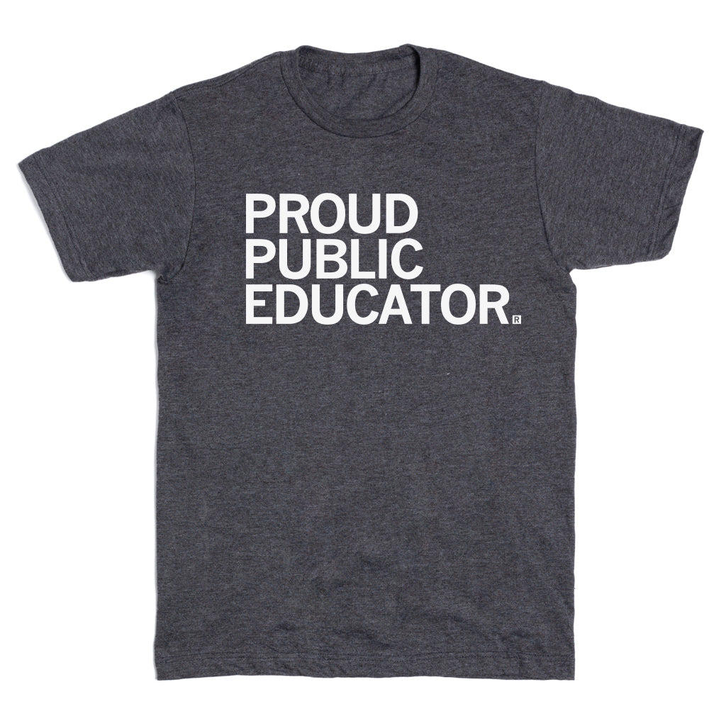 A heather black t-shirt with white ink that reads "Proud Public Educator" in all caps.