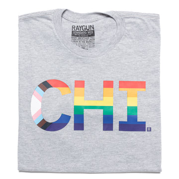 Gray union-made t-shirt featuring CHI printed in a rainbow and progress pride flag pattern for Chicago Pride.