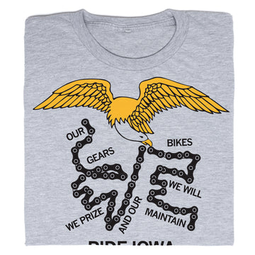 Grey RAYGUN t-shirt featuring a graphic of an eagle with a bicycle chain and the text: OUR GEARS BIKES WE WILL WE PRIZE AND OUR MAINTAIN.