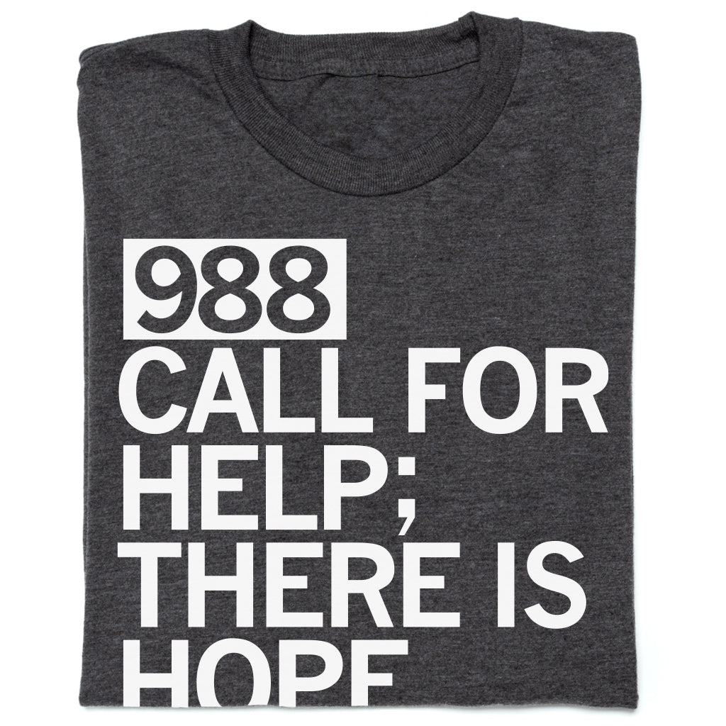 Dark gray T-shirt with the white text 988 CALL FOR HELP; THERE IS HOPE, supporting the 988 lifeline.