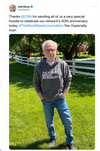 Wolf Blitzer stands outdoors wearing a gray union made pullover hoodie that reads THE WORLD NEEDS JOURNALISTS.