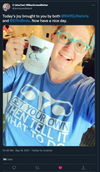 A smiling person in blue glasses and a sweatshop-free shirt that reads GET YOUR OWN THEN TELL IT WHAT TO DO holds a mug with a bird drawing and text that reads perhaps you should consider eating some dicks.