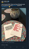 Two RAYGUN books titled Sinister Agenda and Things Kim Reynolds Has Done to Piss Me Off resting on a table.