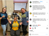 Three smiling librarians wearing a library t-shirt, a Militant Librarian shirt, and an Everyone is Welcome at the Library shirt, standing in a breakroom near a coffee station.
