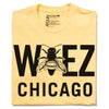 Yellow WBEZ merchandise t-shirt with WEEZ CHICAGO printed in black, featuring a bee graphic in place of the letter E.