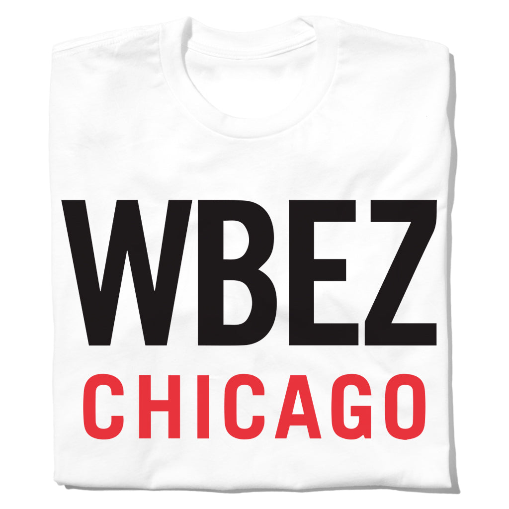 Official WBEZ Chicago merchandise: a white t-shirt featuring the WBEZ logo in large black letters above CHICAGO in red.