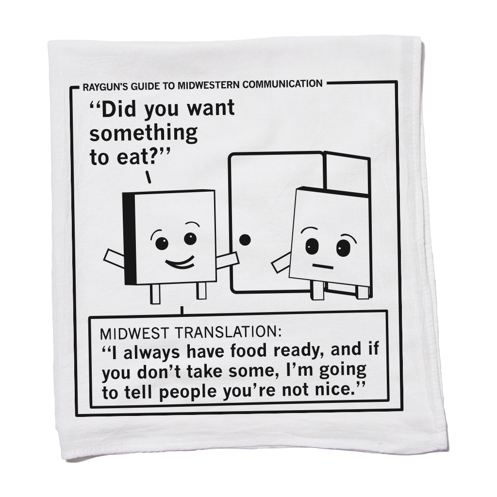 A white RAYGUN flour sack kitchen towel featuring a comic titled Rayguns Guide to Midwestern Communication, translating the phrase Did you want something to eat? as a polite, guilt-laden insistence that the guest must accept food.