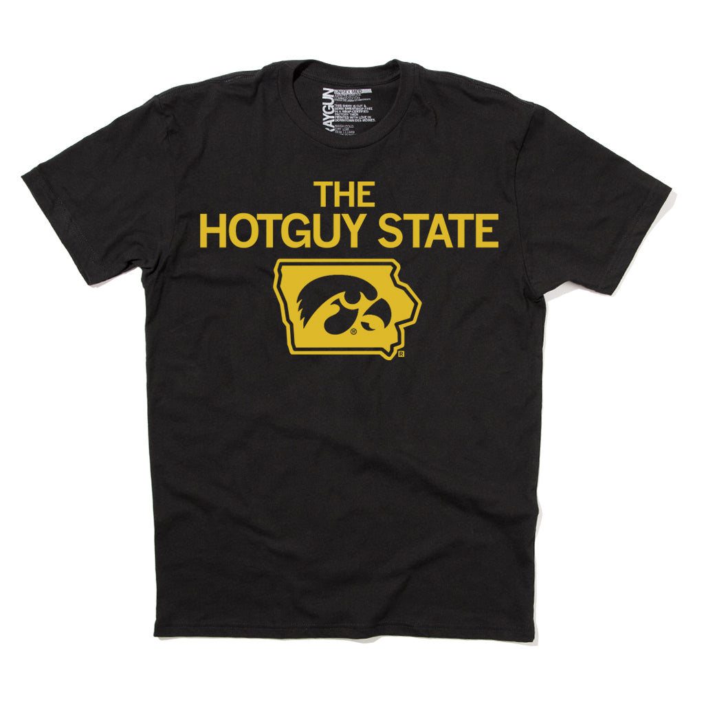 Black RAYGUN t-shirt with yellow text reading THE HOTGUY STATE above a yellow outline of the state of Iowa containing a hawk logo.